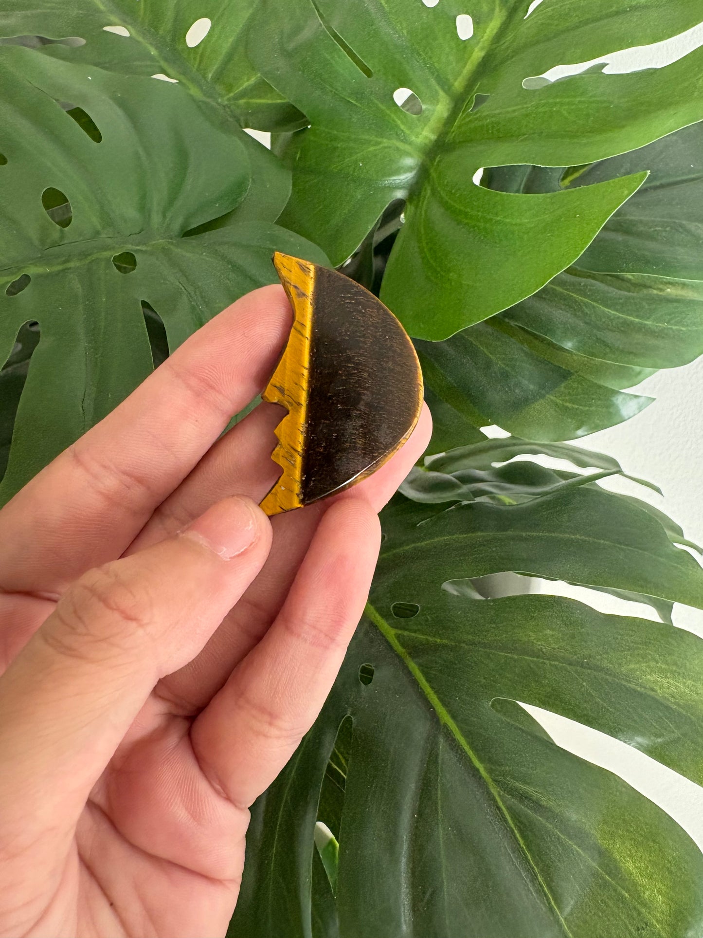 Moon face carved crystal