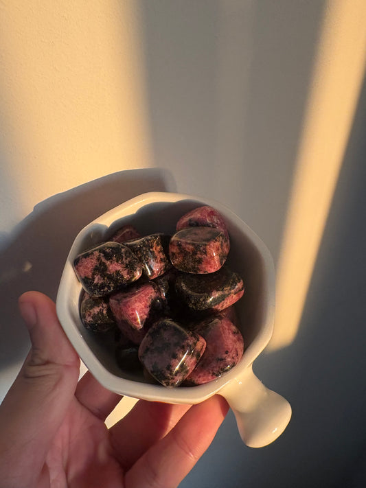 Rhodonite tumbles