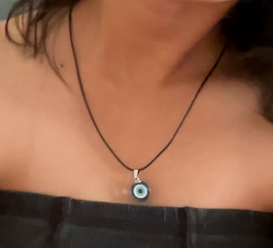 Dainty evil eye pendant